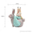 Princesa alce sentada sobre conejo gris